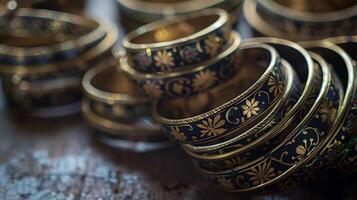 A set of handcrafted bangles each with a unique design and story behind it passed down from grandmother to granddaughter photo