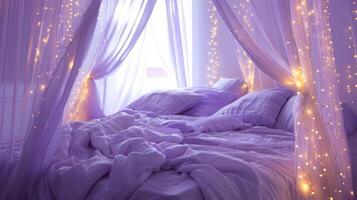 A dreamy canopy bed dd in pastel purple linens and surrounded by delicate fairy lights photo