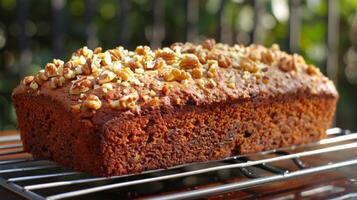 Fluffy and wholesome high oleic acid banana bread made with wholesome ingredients and topped with crunchy walnuts for added healthy fats photo