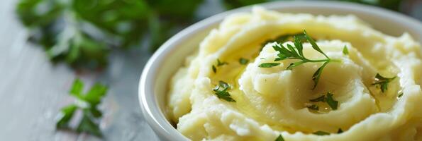 A warm and comforting bowl of mashed potatoes made creamy and delicate with the addition of avocado oil photo