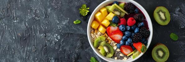 A smoothie bowl decorated with fresh fruit and a drizzle of avocado oil showcasing its use in healthy and nutritious recipes photo