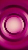 Vertical - stylish abstract background with dynamic smooth gradient circles in vibrant pink, magenta and purple. Copy space for logo or text. This modern background is full HD and a seamless loop. video