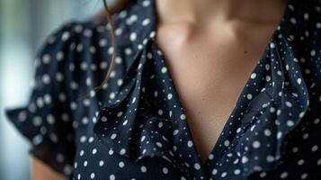For a more subtle take on the trend opt for this polka dot wrap dress with a cascading ruffle along the neckline and hemline for a chic and flirty look photo