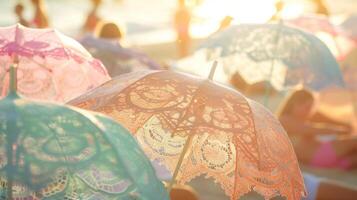 Soft pastelcolored lace umbrellas dot the shoreline as beachgoers relax in the sun the light filtering through the lace adding a playful touch to the coastal scene photo