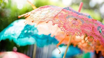 A garden party comes to life with the addition of playful lace umbrellas creating a whimsical atmosphere that invites guests to let loose and have fun photo