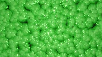 Vibrant oozing green slime abstract background. Microscopic view of an organic cellular structure pattern. Alien organism or texture concept. Full HD and looping motion background. video