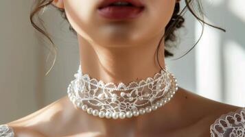 A statement choker necklace made of intricate lace intertwined with lustrous pearls ideal for a playful yet sophisticated look photo