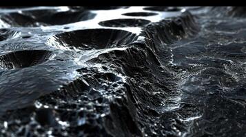 A closeup view of a bubbly shiny surface with deep ridges and grooves giving the impression of an otherworldly landscape photo