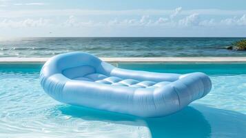 Not your average outdoor furniture this inflatable sofa is perfect for lounging by the pool. Its airfilled design allows it to float in the water giving you a refreshing and comfortabl photo