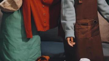 Fashion blogger concept, Young Asian women selling clothes on streaming.Startup small business SME, using smartphone or tablet taking receive and checking in home office video