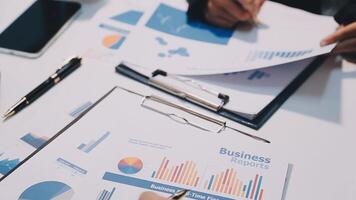 Two executive discussing company growth project success financial statistics, Partner meeting professional investor working start up project for both company with document, laptop and digital tablet. video