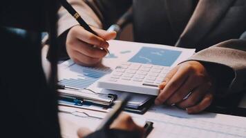 Two executive discussing company growth project success financial statistics, Partner meeting professional investor working start up project for both company with document, laptop and digital tablet. video