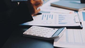 Two executive discussing company growth project success financial statistics, Partner meeting professional investor working start up project for both company with document, laptop and digital tablet. video