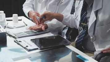 Doctors in office working on medical report video