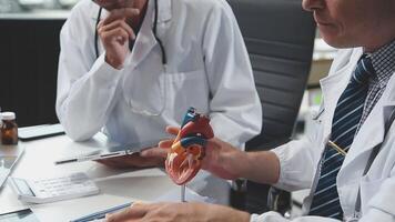 Doctors in office working on medical report video