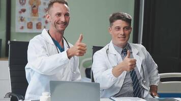 Doctors in office working on medical report video