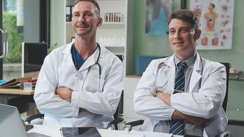 Doctors in office working on medical report video
