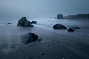 A Beach with Rocks and Water on It, Background of a Beach with Rocks and Water on It photo