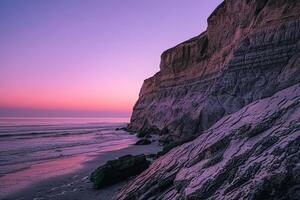 A Sunset Over the Ocean with Cliffs and Rocks, Background of a Sunset Over the Ocean with Cliffs and Rocks photo