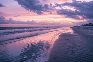 A Beach with Waves and Clouds at Sunset photo
