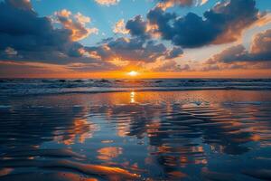 A Sunset over the Ocean with Clouds Reflected in the Water photo