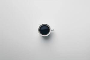 Cup of Coffee on White Surface Background photo