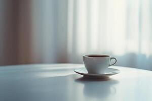 Cup of Coffee on Table in Front of Window, Nature Background photo