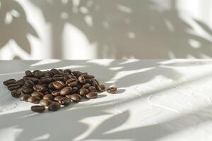 Coffee Beans on a White Table with Shadows Background photo