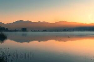 Lake with Mist and Mountains in the Background photo