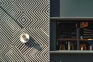 Building with Black and White Pattern on Wall Background photo