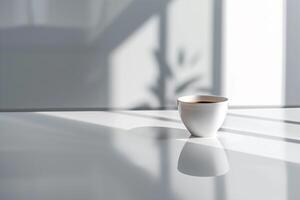 A Coffee Cup Sitting on a Table in Front of a Window photo