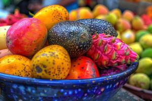 A Bowl of Fruit Sitting on a Table Background photo