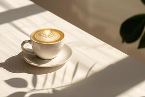 A Cup of Coffee on a Table with a Shadow photo