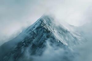 A Mountain is Covered in Fog and Snow Background photo