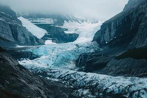 A Glacier Is Flowing down a Mountain Background photo