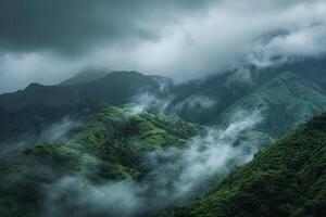 a view of green mountains covered in clouds background photo