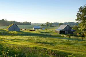 a field with a barn and a fence background photo