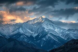 a mountain range is shown in the sky with clouds background photo