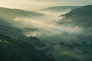 a view of a valley with mist and fog background photo