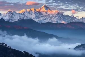 the mountain range is seen from above the clouds background photo