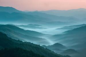 a view of the mountains in the mist background photo