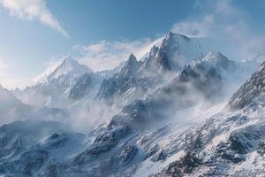 A snowy mountain range with a sun shining on it background photo