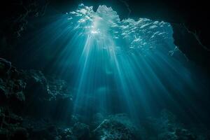 Sunlight Shining Through a Cave with Fish Swimming in It Background photo
