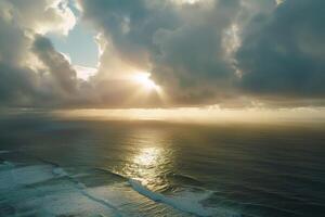 Sunset Over the Ocean with Clouds and Waves Background photo