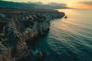 An Aerial View of Cliffs and Sea at Sunset Background photo