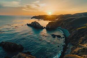 the sun sets over the ocean and coastline in Big Sur background photo