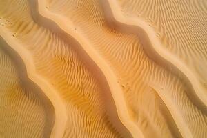 sand dunes in the desert with a yellow background photo