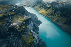 an aerial view of a river flowing through a valley background photo