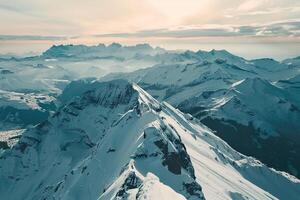 a view of a mountain range with snow covered peaks background photo