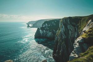 a view of the ocean and cliffs from a cliff with background photo